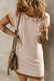 Ribbed tee dress with colorblock sleeves and chest pocket.
