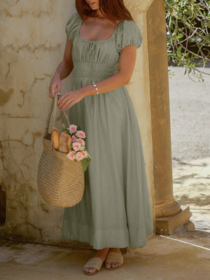 Sage green smocked waist maxi dress with puff sleeves and square neckline, a-line cut