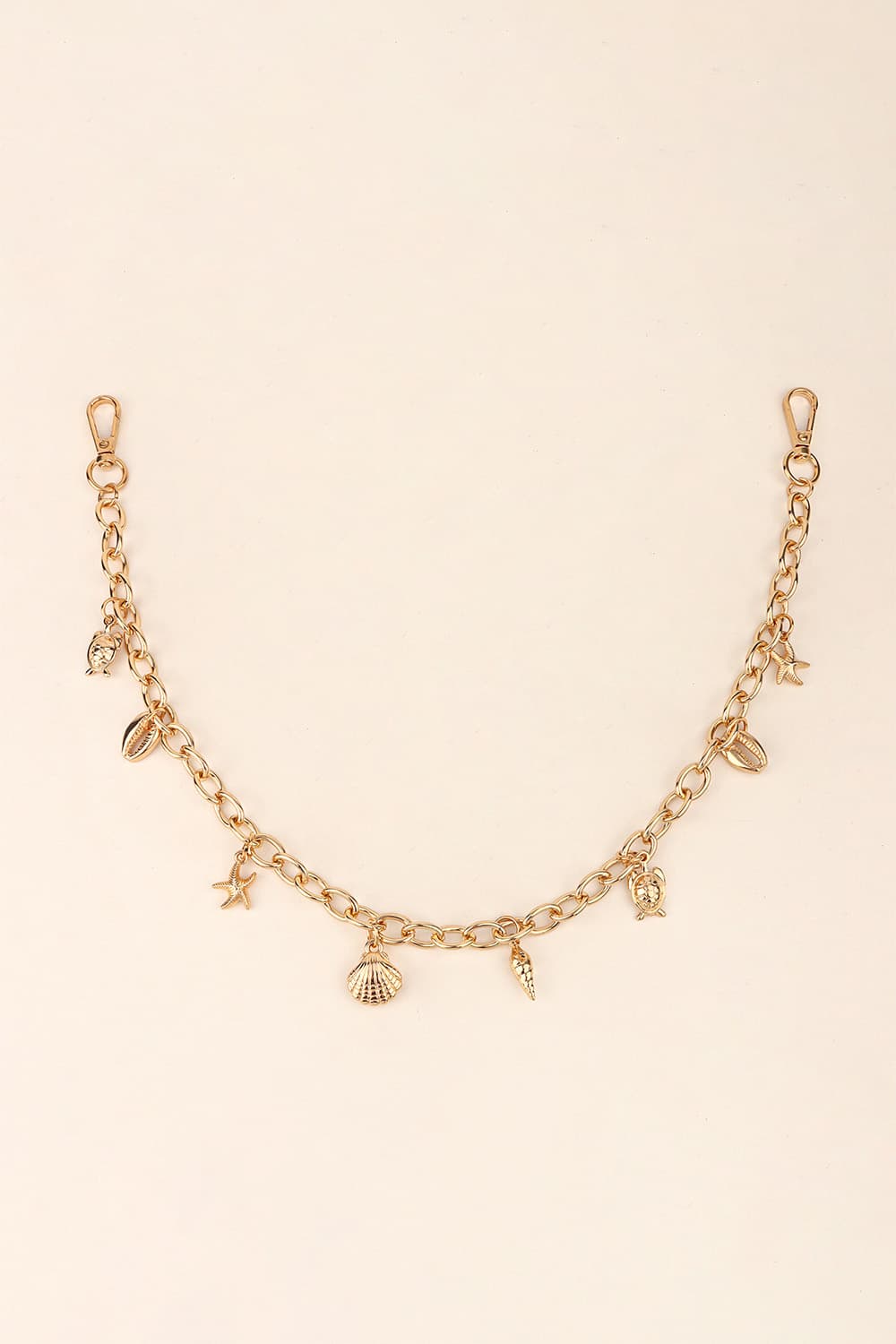 Gold chain belt with seashell, starfish, and turtle charms