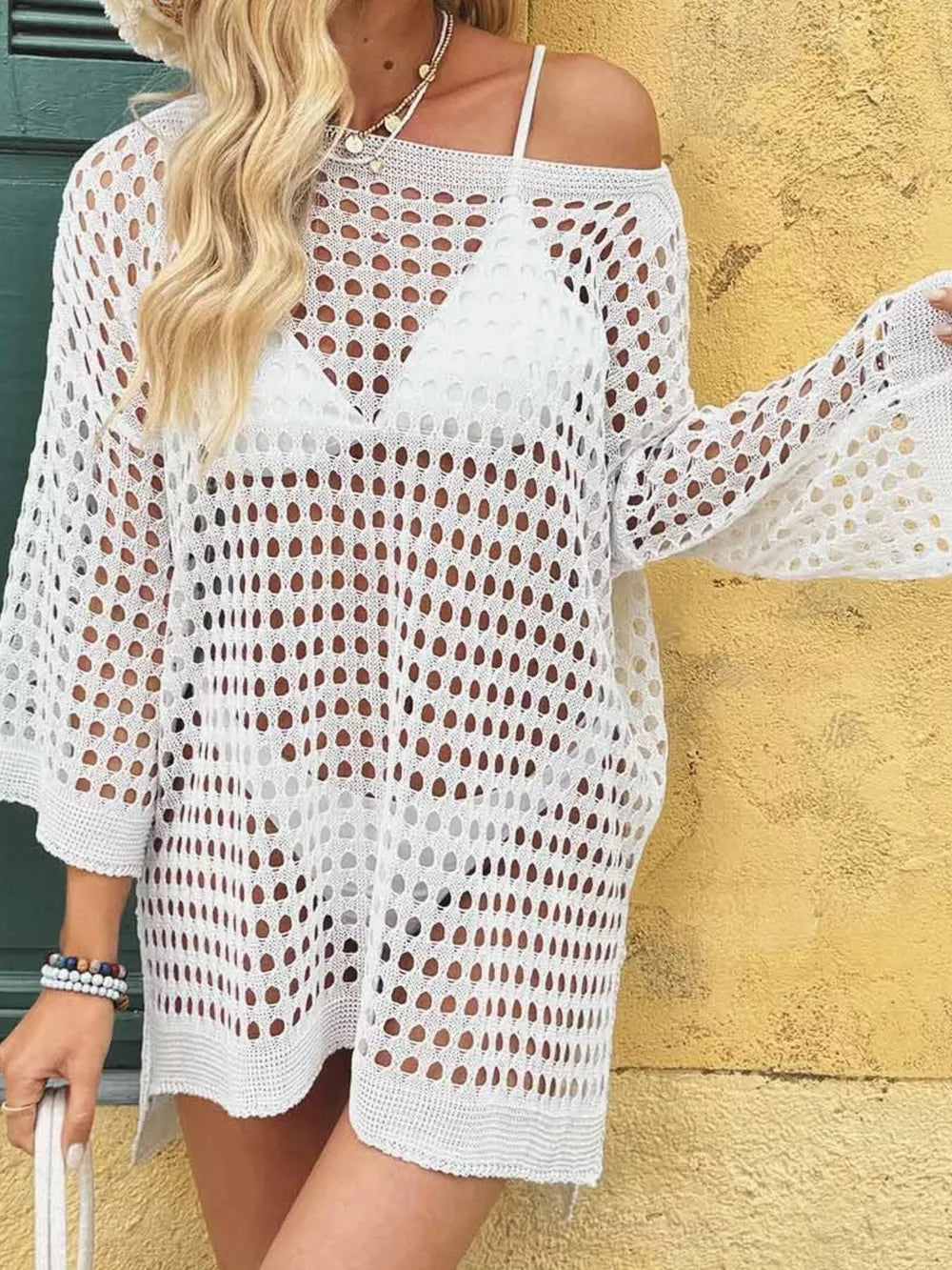 White openwork crochet knit swim cover-up with crew neck and bell sleeves.