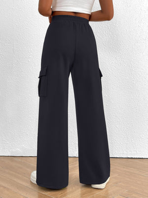 Navy high waist cargo sweatpants with drawstring and side pockets.