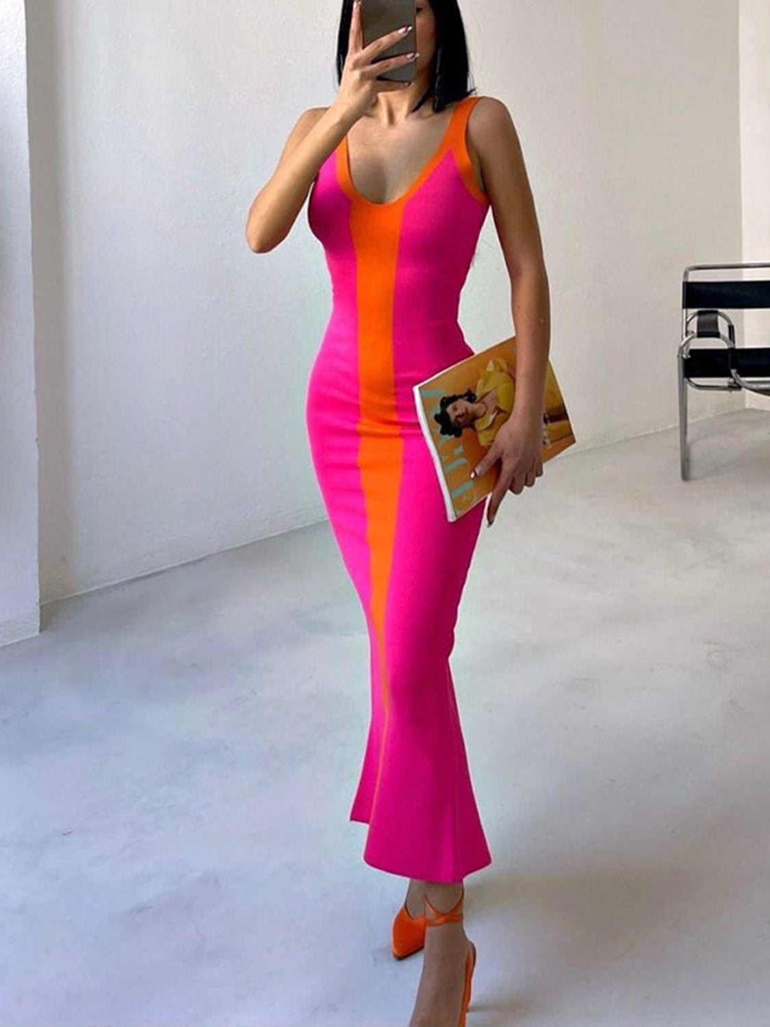 Contrast panel bodycon maxi dress in pink with orange stripe, V-neck, sleeveless, flared hem.