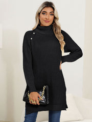 Black ribbed turtleneck tunic with pearl button detail on shoulder, side slits.