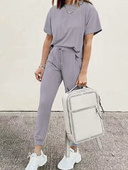 Grey casual round neck top and jogger pants set with drawstring waist.