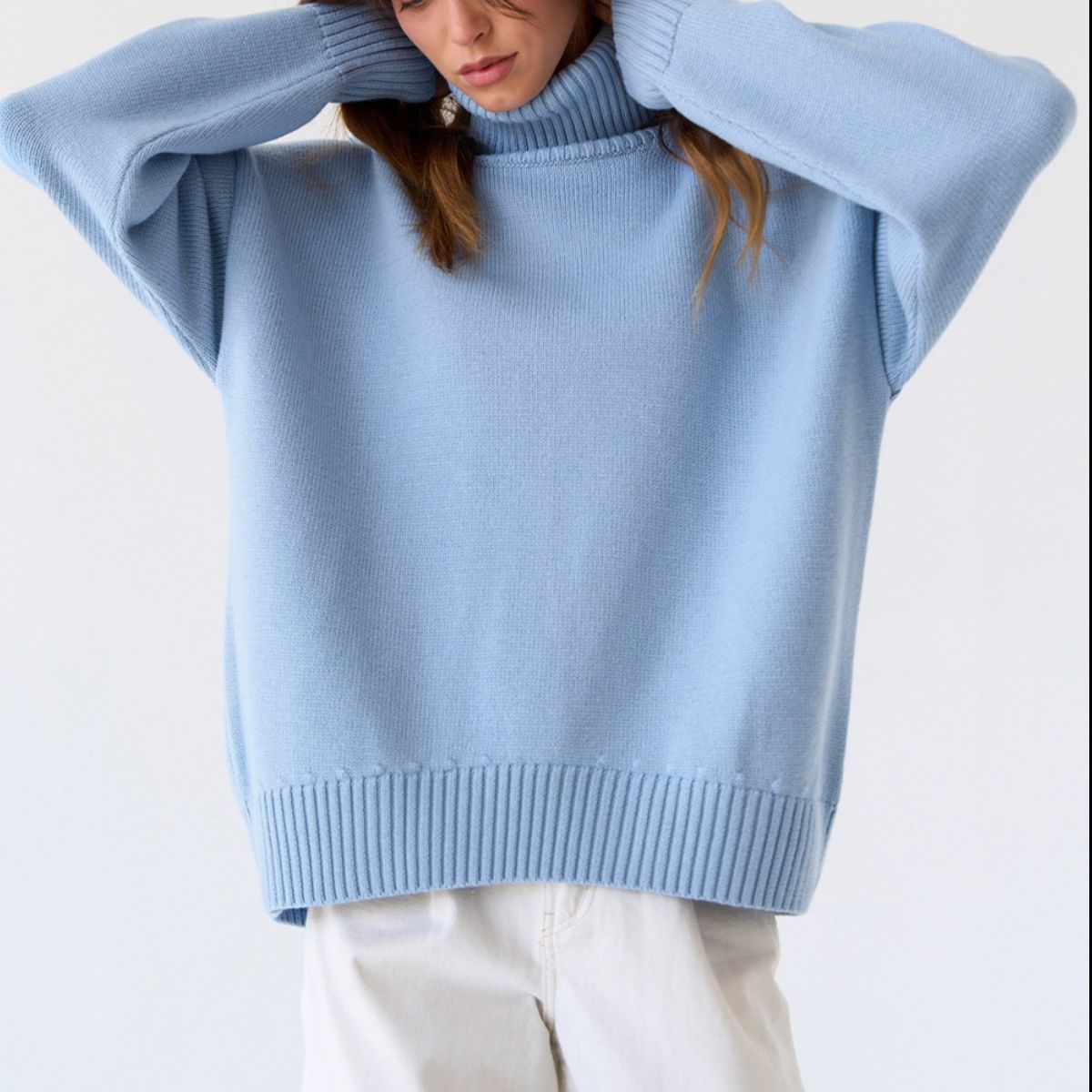 Relaxed Misty Blue roll-neck sweater with boxy fit and ribbed cuffs and hem.