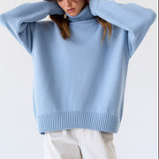 Relaxed Misty Blue roll-neck sweater with boxy fit and ribbed cuffs and hem.