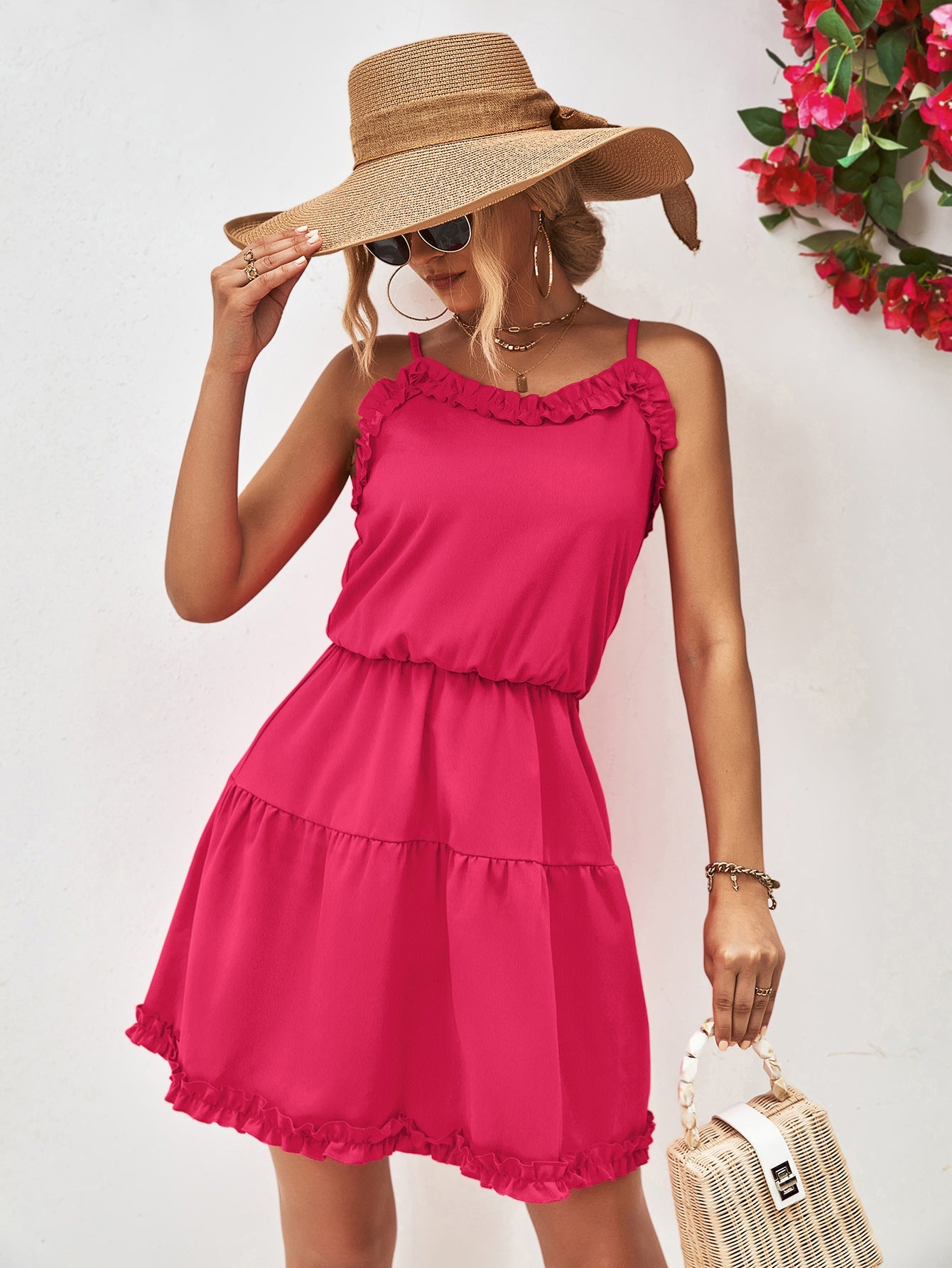 Hot Pink ruffled camisole tiered mini dress with elastic waist and ruffle hem.