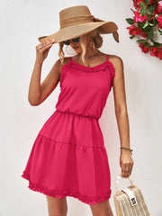 Hot Pink ruffled camisole tiered mini dress with elastic waist and ruffle hem.