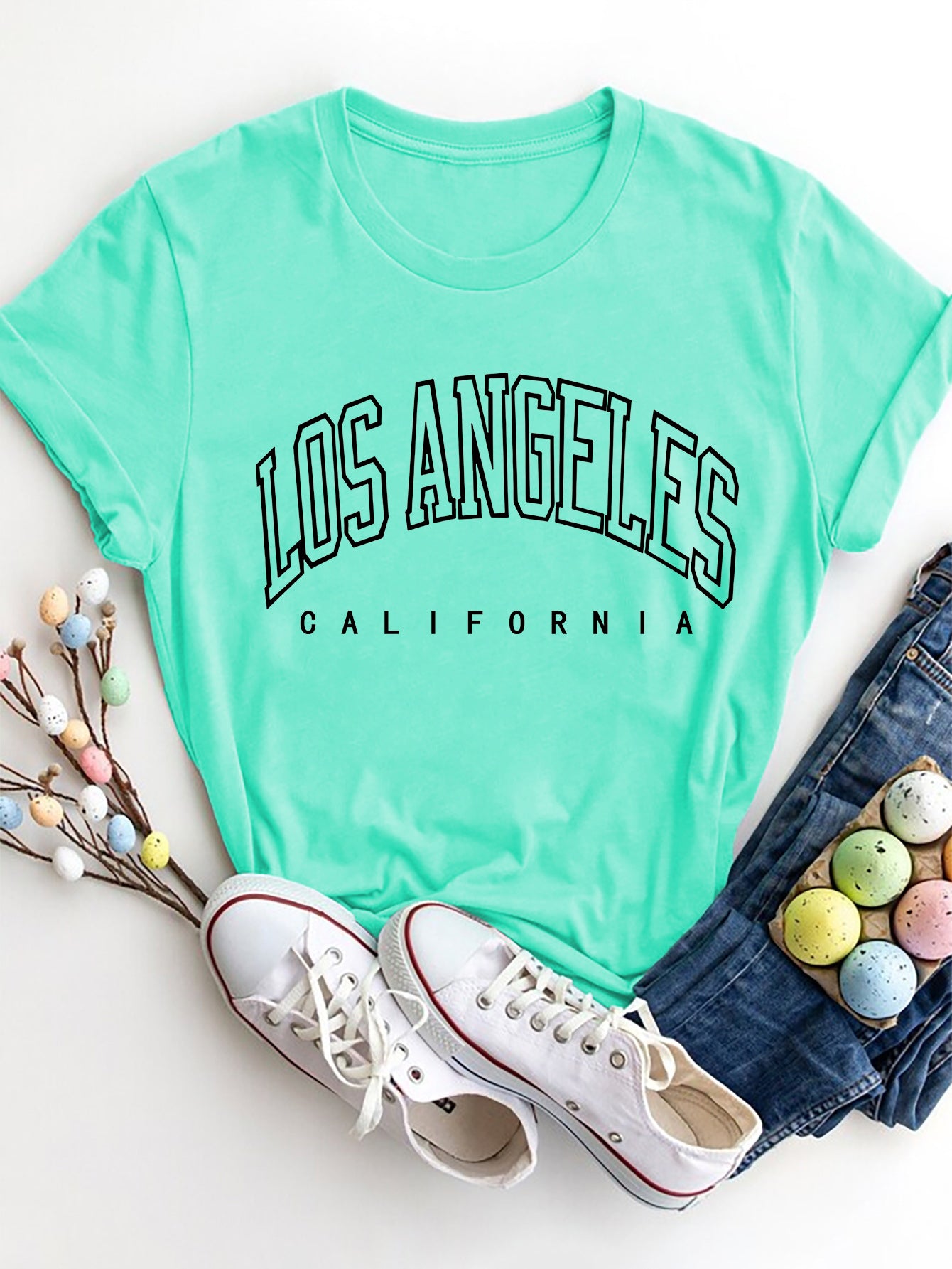 Aqua t-shirt with black Los Angeles California graphic print.