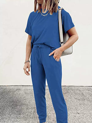 Blue cotton round neck top and jogger pants set with drawstring waist and pockets.