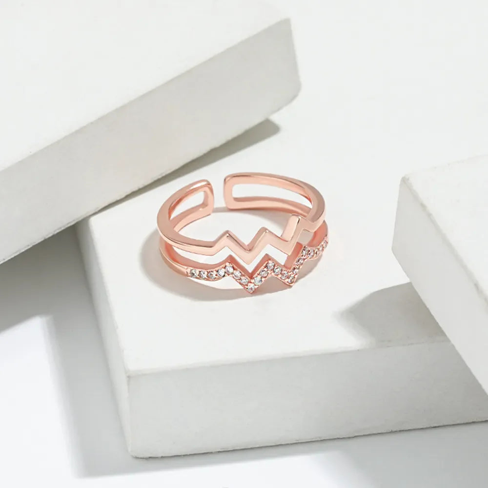 Rose gold zigzag split band ring with pave crystals