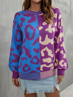 Split leopard knit sweater with statement sleeves in blue/green and purple/apricot acrylic.