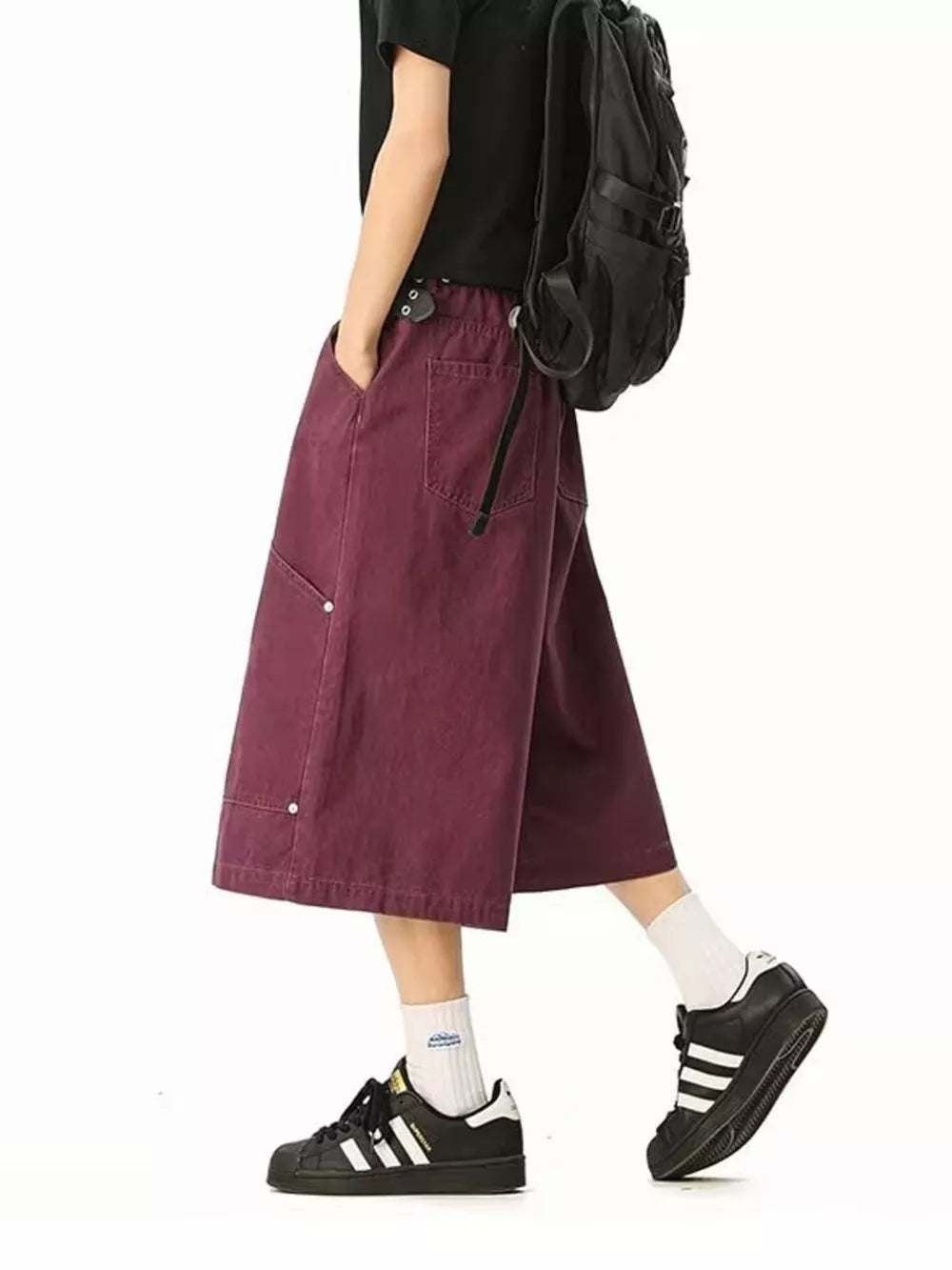 Relaxed fit cargo shorts in purple with utility pockets and a below-knee length.