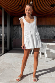 White gathered waist bow-shoulder romper with pockets