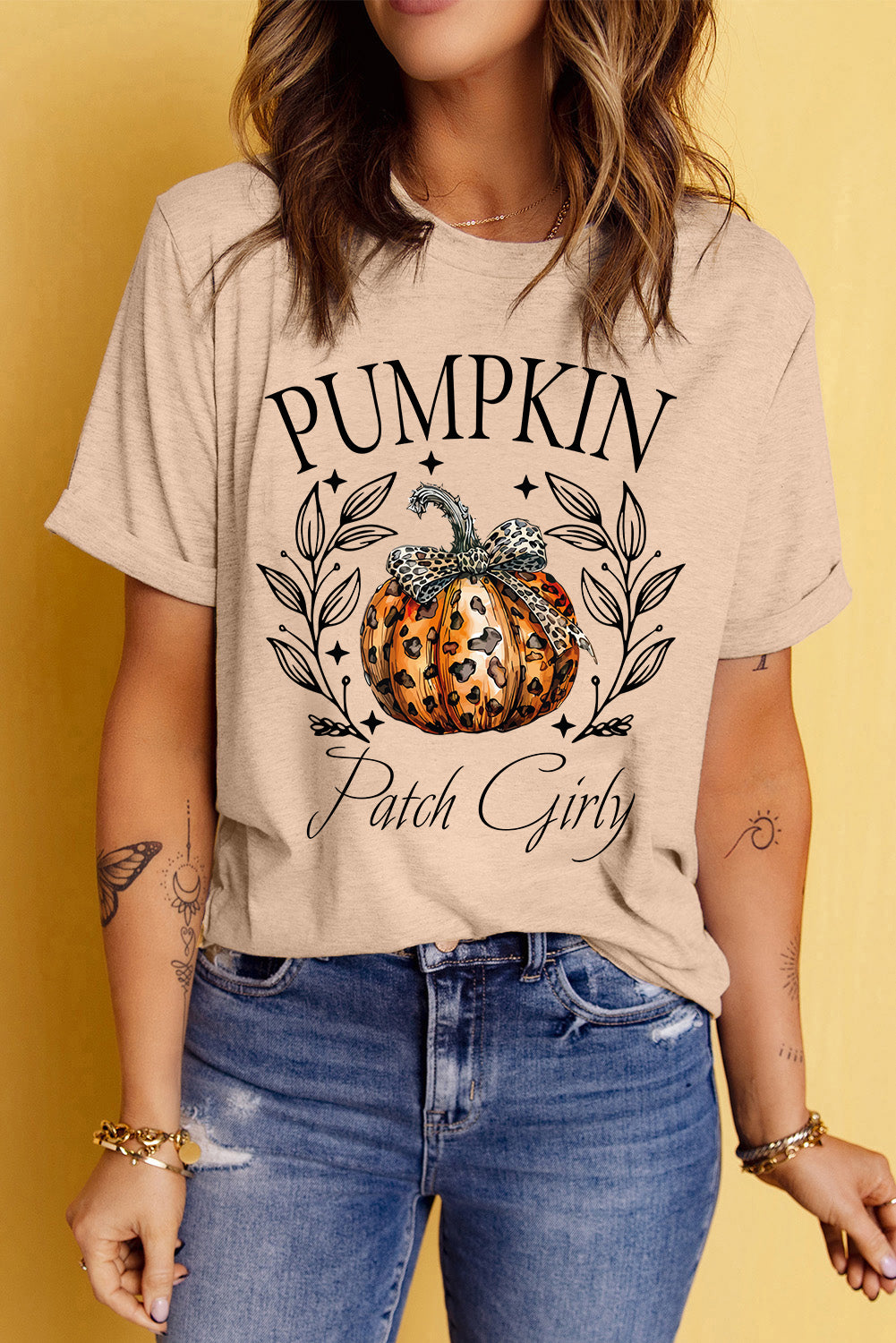 Tan t-shirt with pumpkin graphic and leopard bow, "Pumpkin Patch Girly" text
