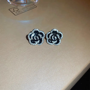 Black rose stud earrings with crystal halo detail