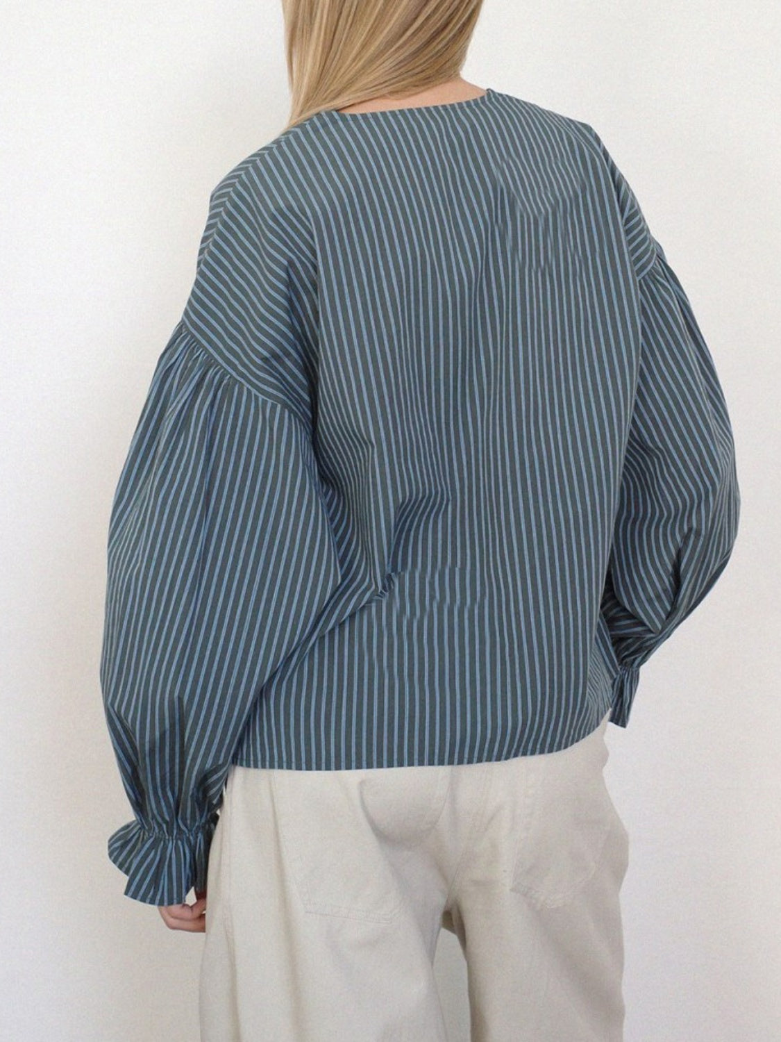 Striped blouse with voluminous sleeves and ruffled cuffs, shown in Stripe.