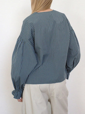 Striped blouse with voluminous sleeves and ruffled cuffs, shown in Stripe.