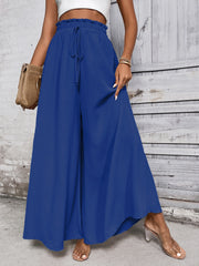Royal blue palazzo trousers with ruffled waistline and drawstring, wide leg, casual flowy fit.