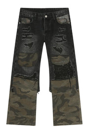 Distressed wide-leg jeans in dark denim with camouflage panels and rips.