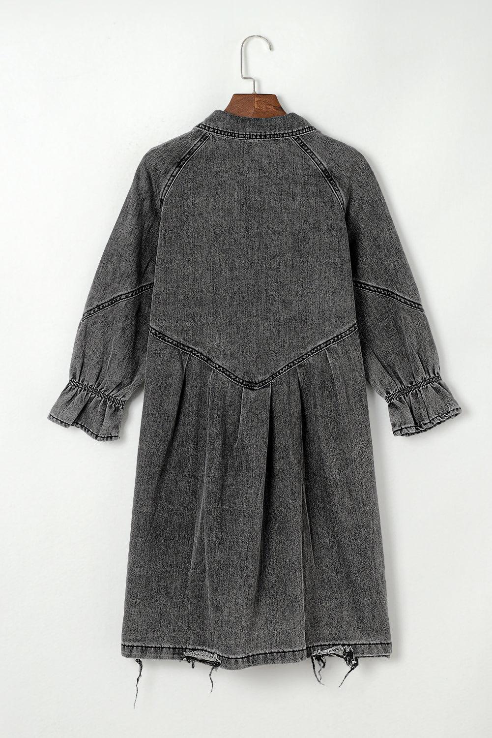 Gray denim shirtdress with ruffled cuffs and frayed hem.