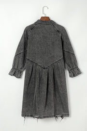 Gray denim shirtdress with ruffled cuffs and frayed hem.