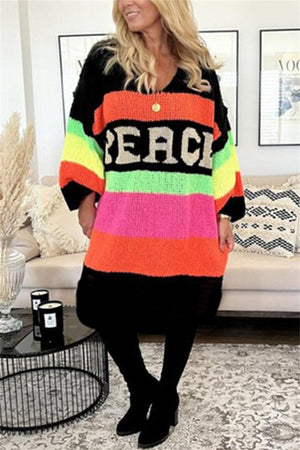 Black midi sweater dress with rainbow stripes and PEACE lettering, V-neck, long sleeves.