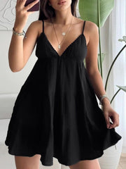 Black cotton tiered mini dress with lace trim V-neck and spaghetti straps