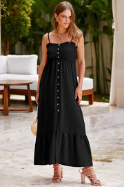 Black smocked bodice maxi dress with button detail and tiered hem.