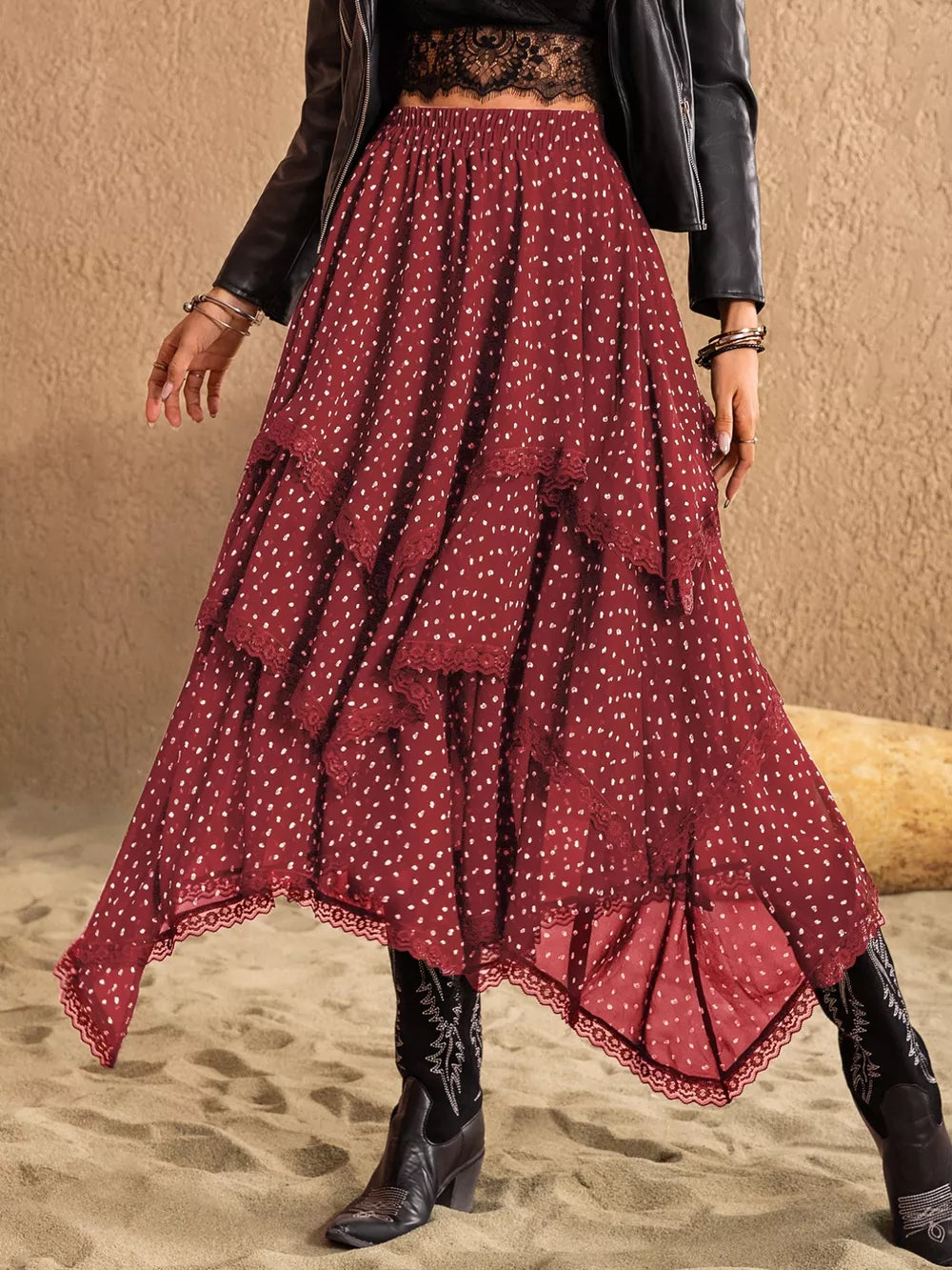 Burgundy tiered midi skirt with white polka dots and lace trim.