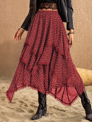 Burgundy tiered midi skirt with white polka dots and lace trim.