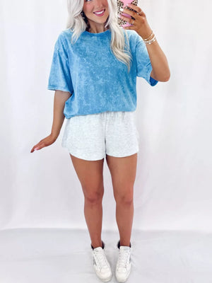 Mineral washed blue cotton crew neck oversized t-shirt with short sleeves.