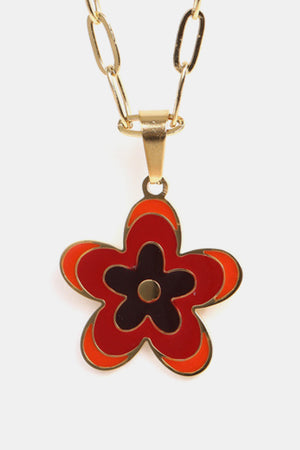 Enamel floral pendant necklace with gold-plated chain, featuring red and orange petals and a dark center.