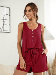 Burgundy ribbed Henley tank top with button detail and drawstring shorts.