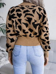 Camel abstract knit cropped sweater with black pattern, ribbed hem