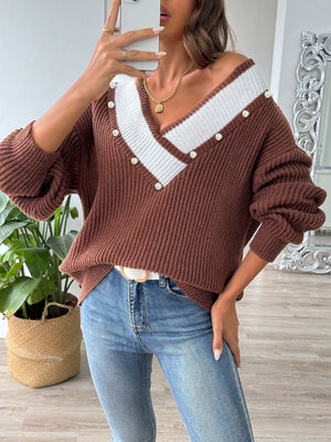 Brown ribbed knit sweater with V-neck, white stripe detail and pearl buttons.