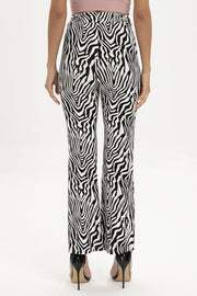 Zebra print flared leg trousers with a high waist and wide leg.