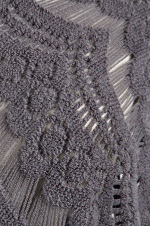 Dark gray acrylic crochet poncho with open knit pattern and fringe detail.