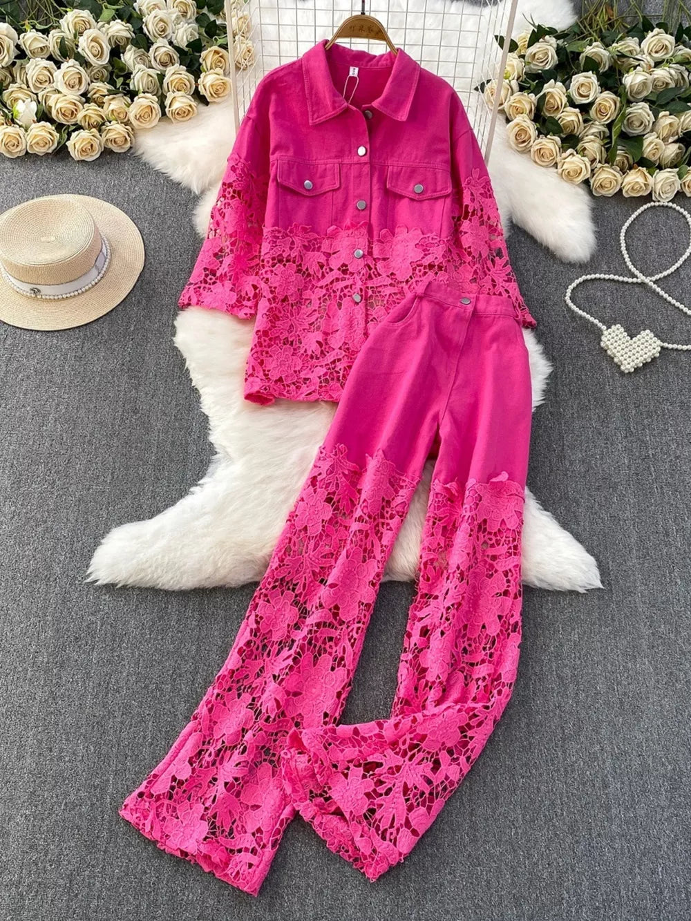 Rose red lace-embellished two-piece set with collared button-up jacket and wide-leg pants.