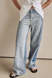 Panelled wide-leg denim trousers in light wash with contrast panels and a relaxed fit.