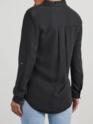 Black washed denim utility shirt with buttoned cuffs and back pleats.