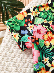 Baby boys' black tropical print short sleeve shirt with hibiscus flowers and leaves.
