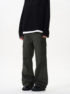 Tailored cargo pants in military green with versatile pockets and a relaxed fit.