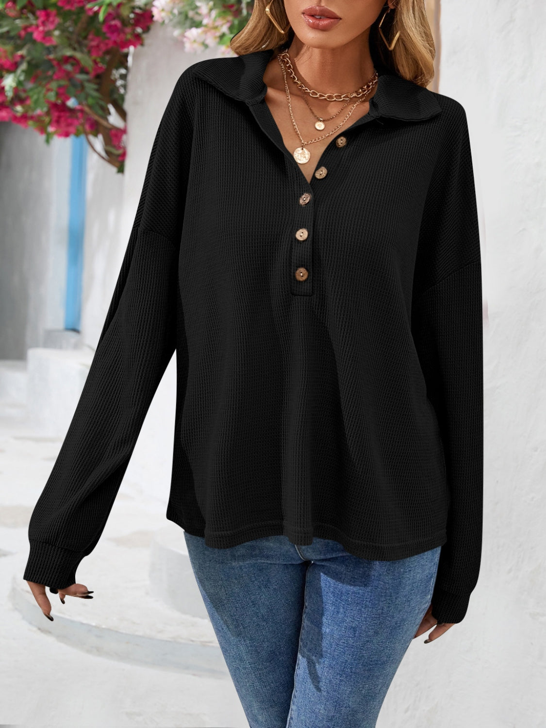 Black waffle knit henley blouse with collar and button detail