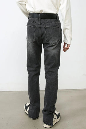 Split-hem washed denim trousers in dark, with a straight leg and back pockets.
