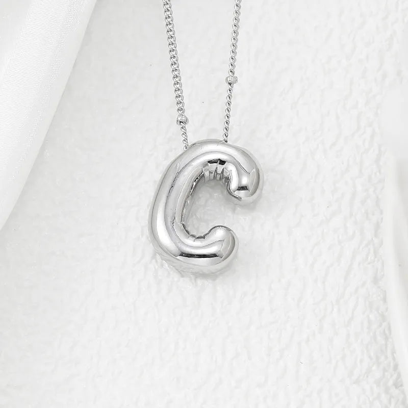 Sculpted initial pendant necklace in silver with a beaded chain, Style C.