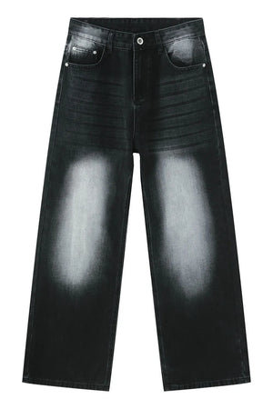 Faded wash baggy denim jeans in dark, with a wide leg and distressed detailing.