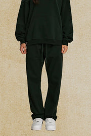 Relaxed fit joggers in Black Forest with drawstring waist and cuffed ankles.