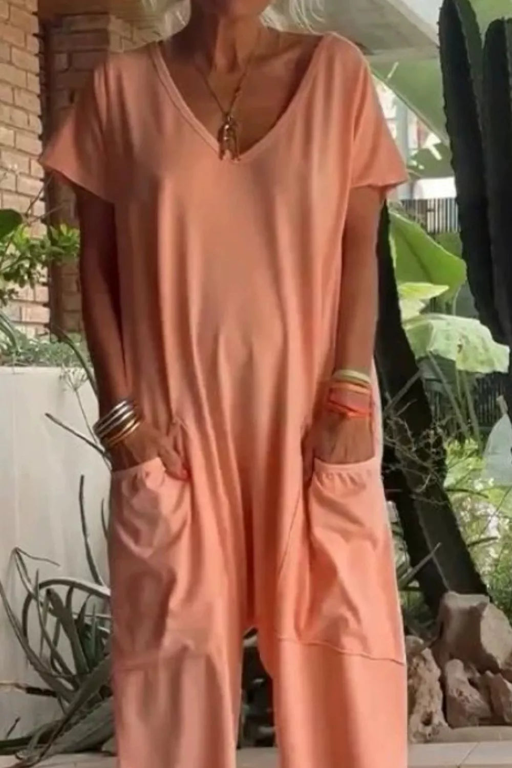 Casual V-neck Short Sleeve Jumpsuit With Pockets in Orange, close-up detail