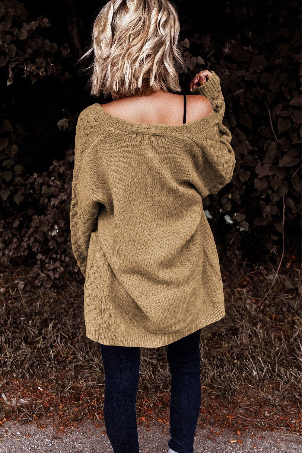 Khaki open-knit pocket cardigan with textured cable knit sleeves and a relaxed fit.